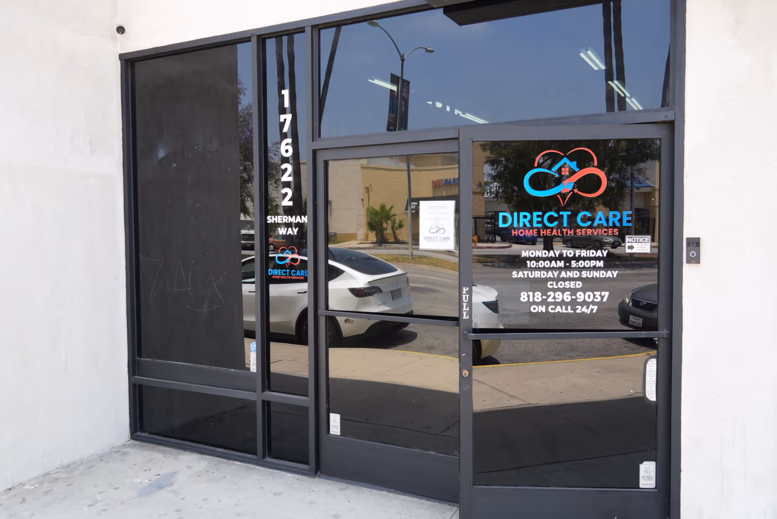Exterior glass storefront entrance for Direct Care Home Health Services.
