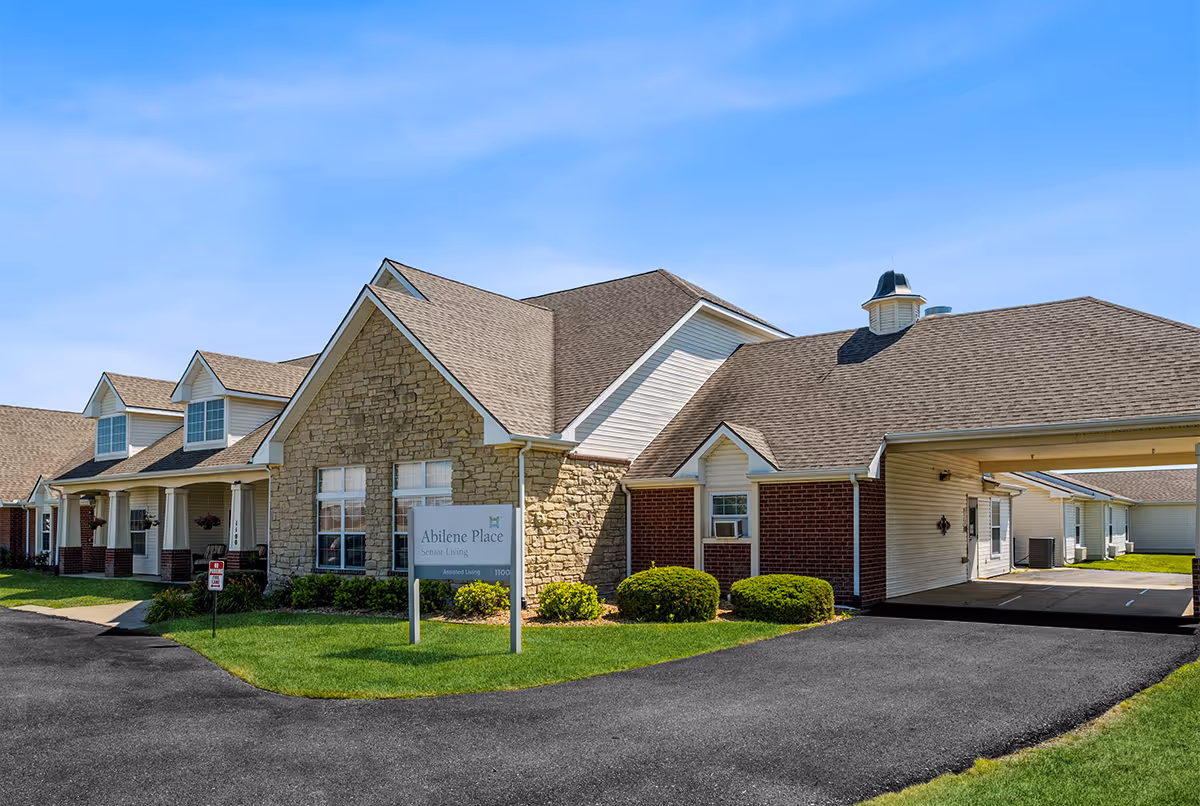 Exterior view of Russet Adult Family Home with brick facade and manicured landscaping.