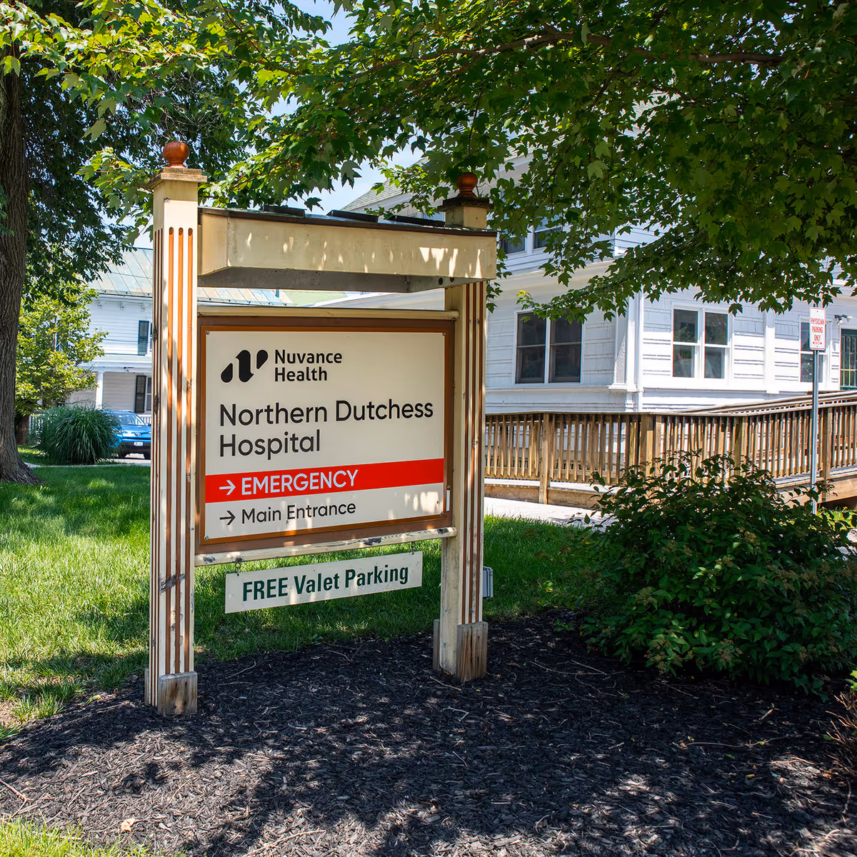 Sign for Nuvance Health Northern Dutchess Hospital Emergency and Main Entrance outdoors with Free Valet Parking.
