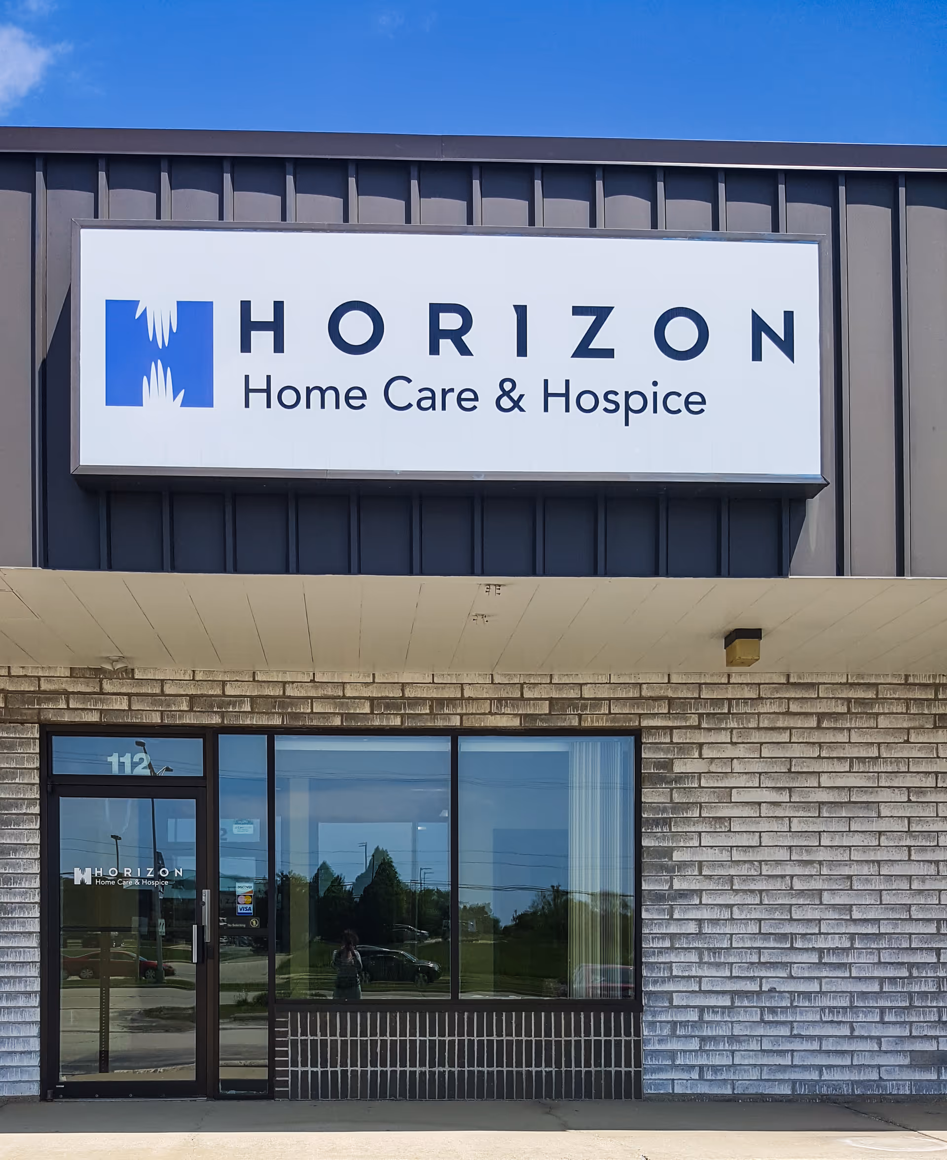 Front view of Horizon Home Care & Hospice building with a large sign.