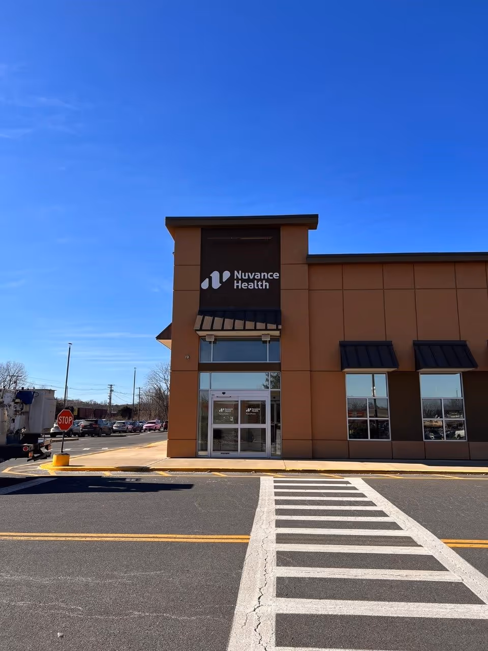 Exterior view of Nuvance Health Medical Practice – Endocrinology Kingston building with parking.