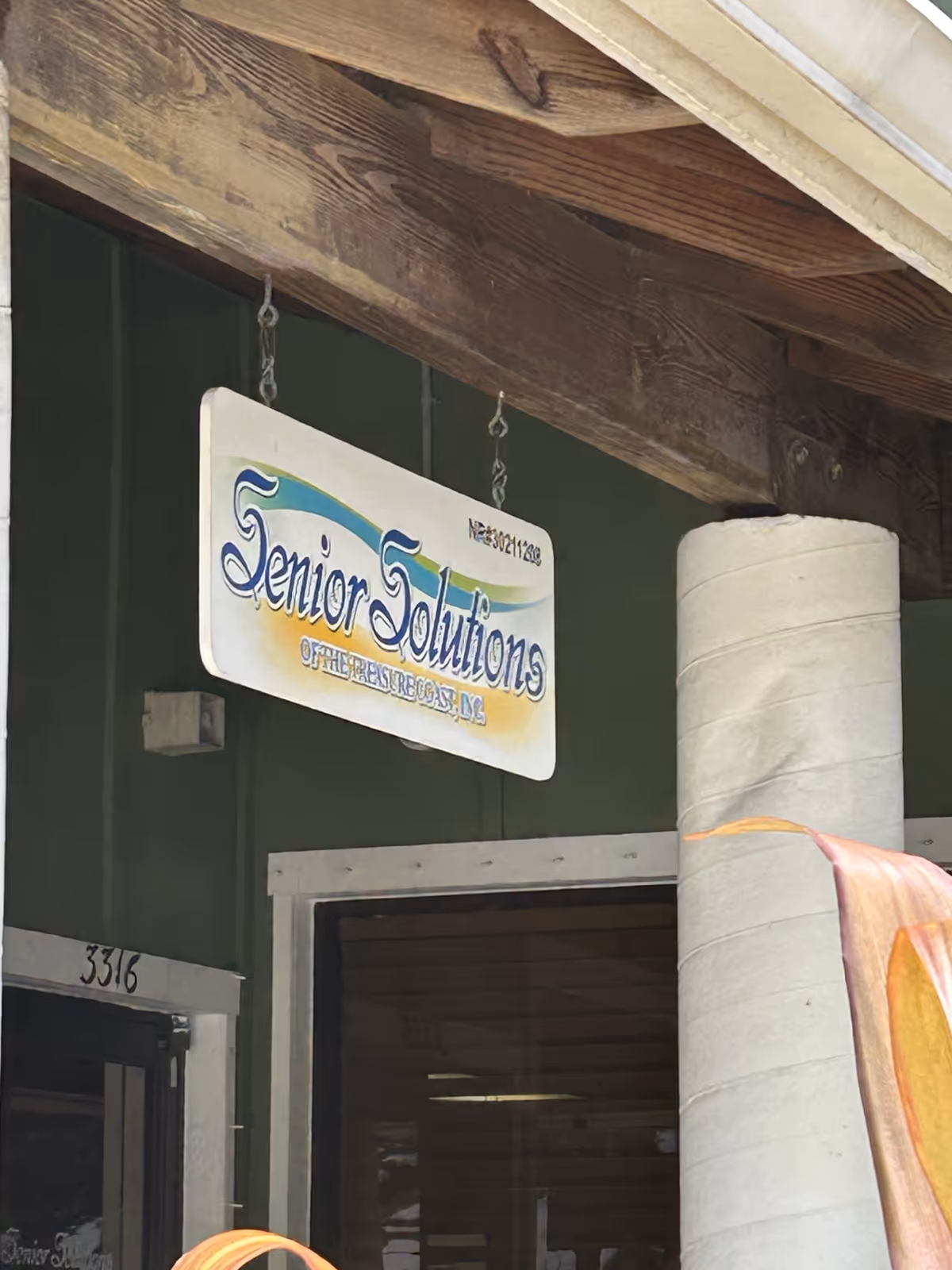 Exterior view of Senior Solutions sign at the facility entrance.