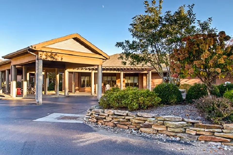 Exterior view of Elison Assisted Living & Memory Care of Marietta entrance with portico.
