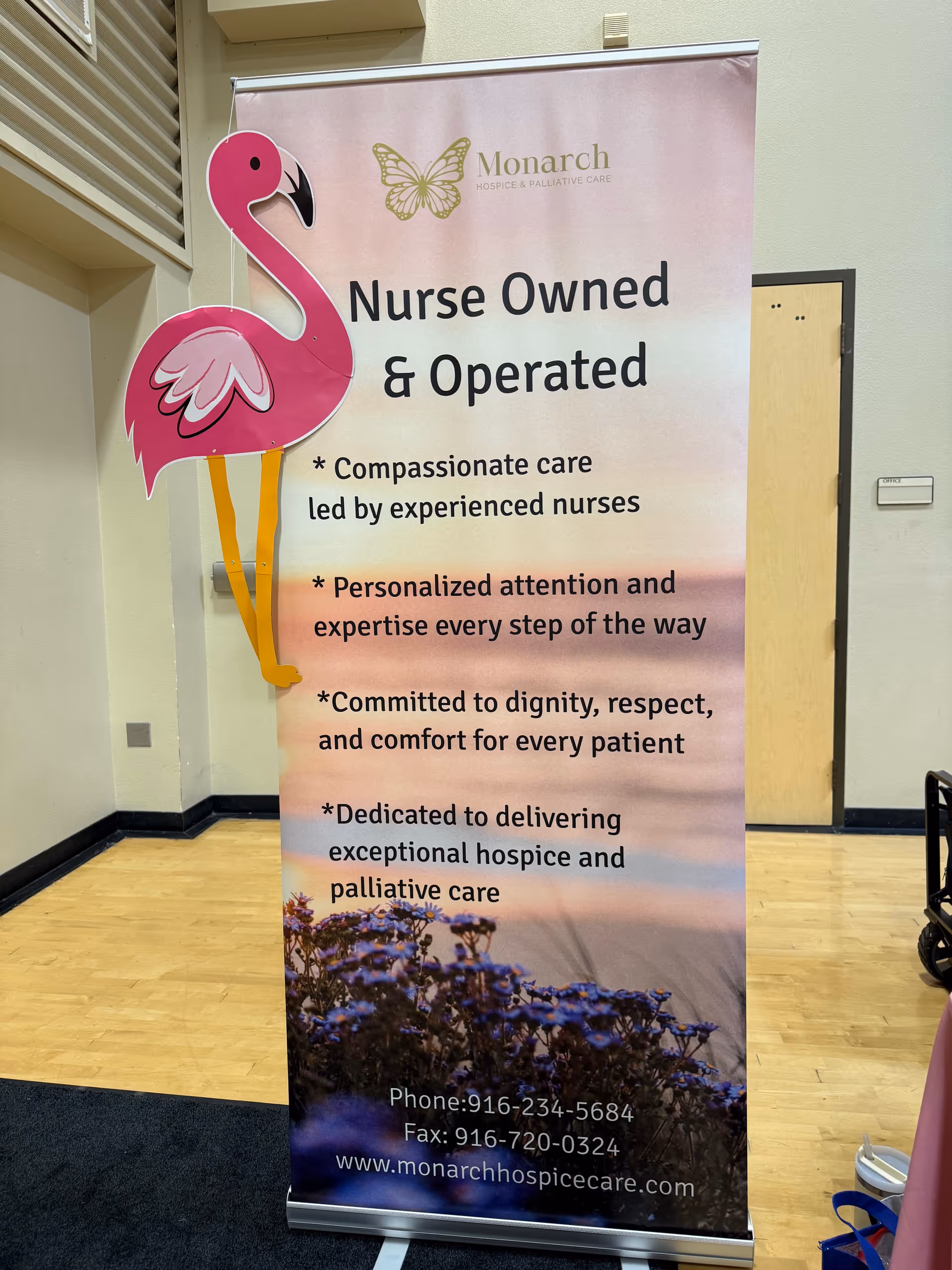 Indoor banner with pink flamingo and Nurse Owned and Operated text.