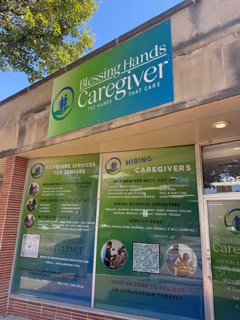 Exterior storefront of Blessing Hands Caregiver Home Care with blue signage and posters.