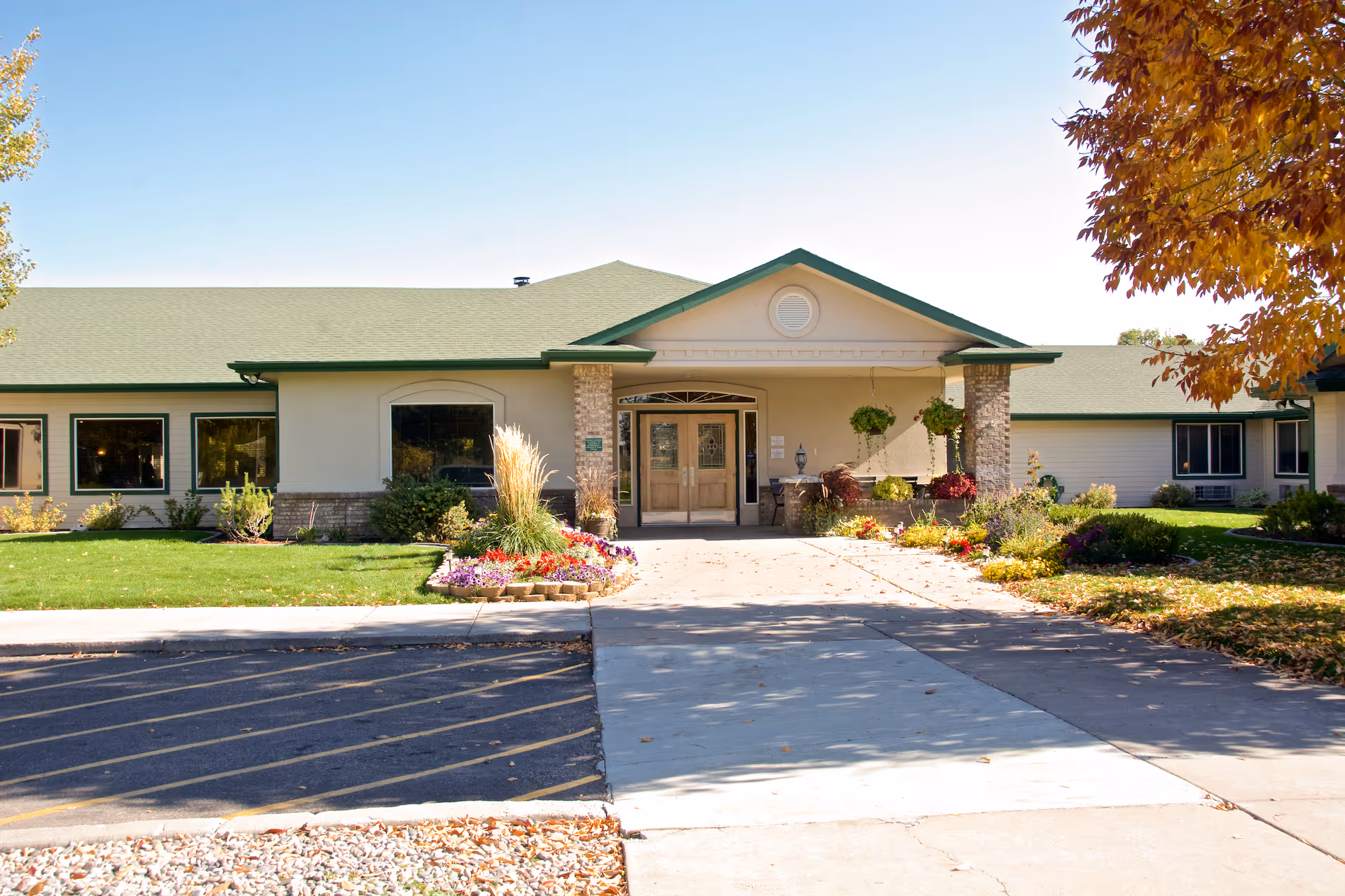 Front view of Brookdale Chubbuck senior living with landscaped walkway and entrance.