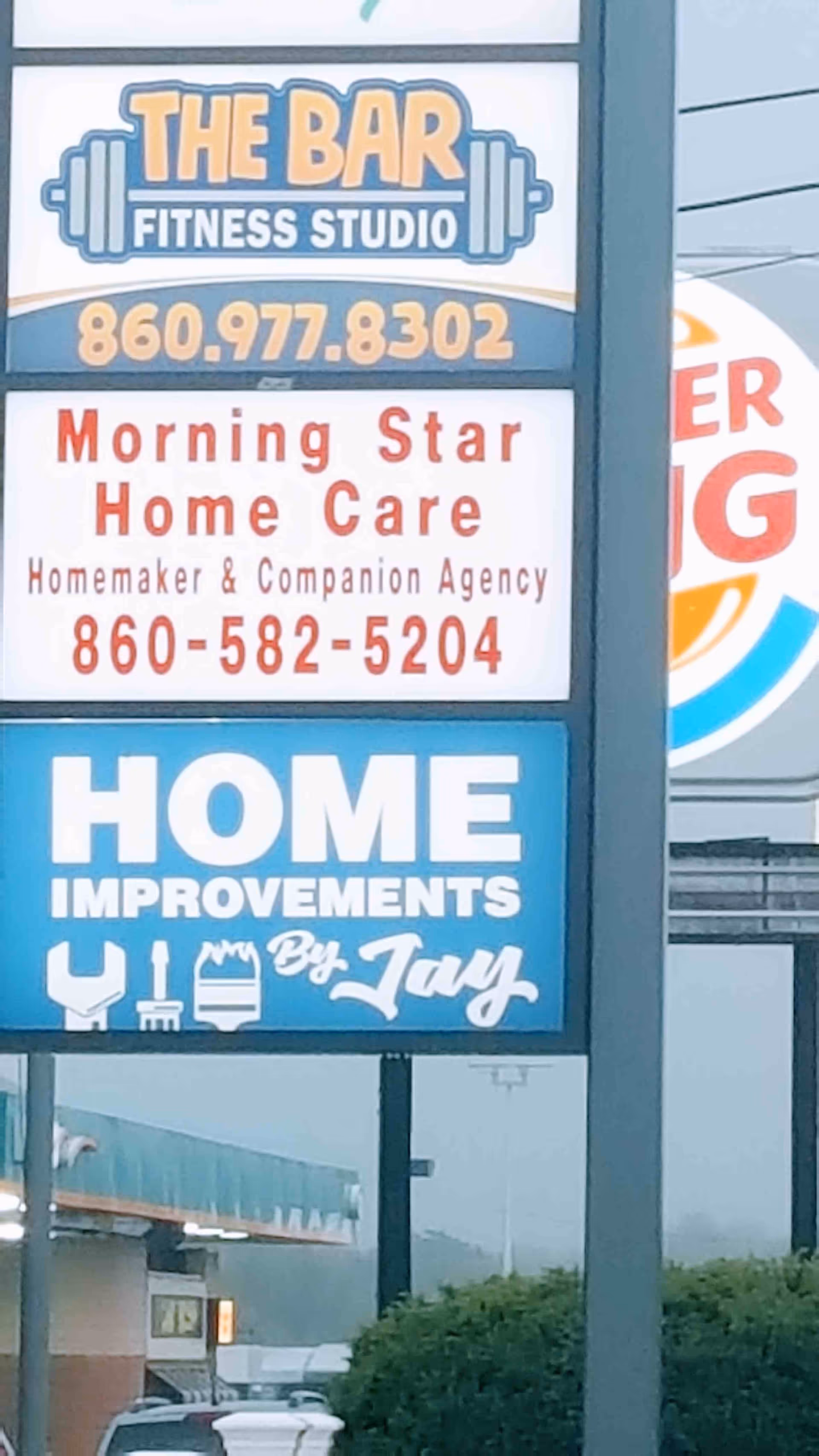 Outdoor multi-panel signboard advertising Morning Star Home Care LLC and other services.
