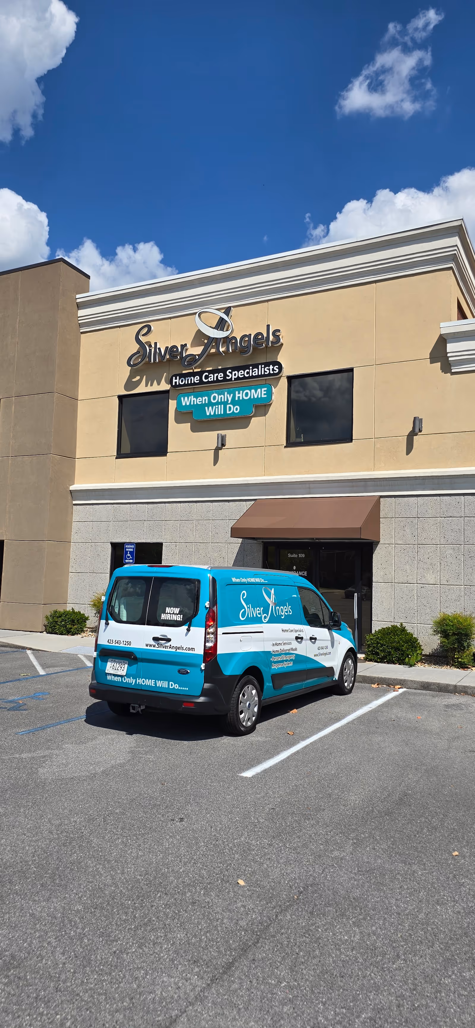 Exterior view of the Silver Angels of Tennessee Carter, LLC building with a blue service van