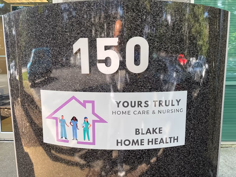Exterior sign shows the 150 address and a Yours Truly Home Care & Nursing banner.
