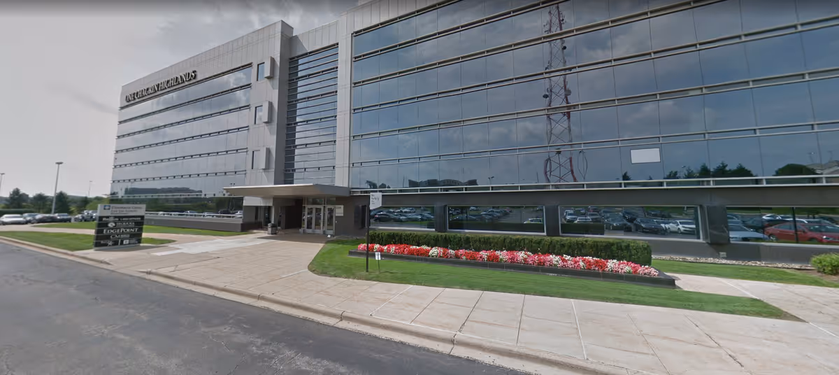 Extol Haven Home Care building exterior with glass facade and landscaped entrance.