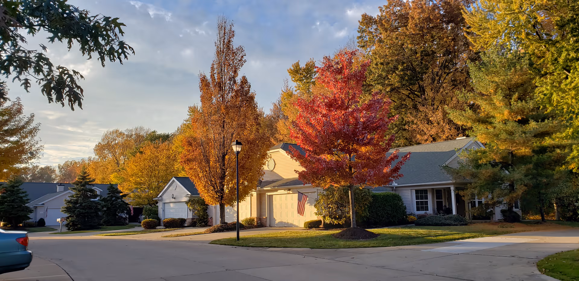Exterior view of Sprenger Health Care Towne Center Community Campus with fall trees.