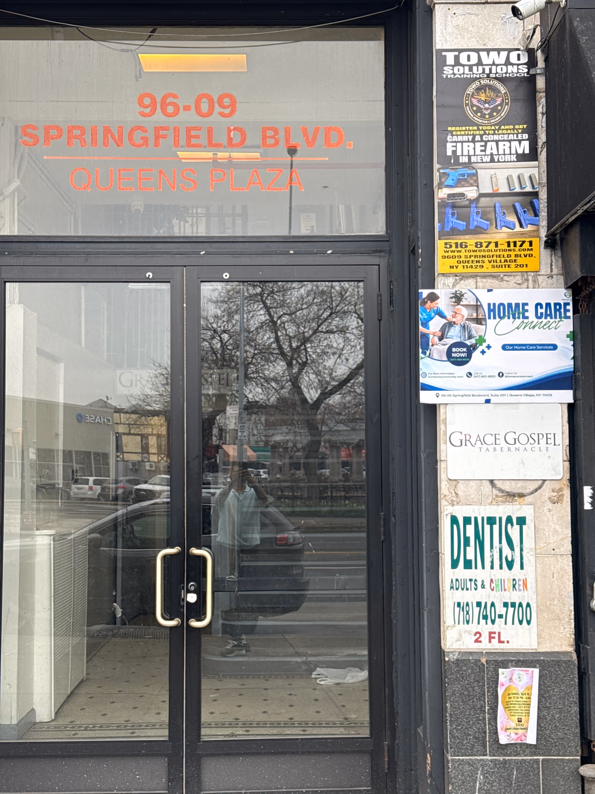 Glass double doors storefront with orange text and Home Care Connect sign on the right