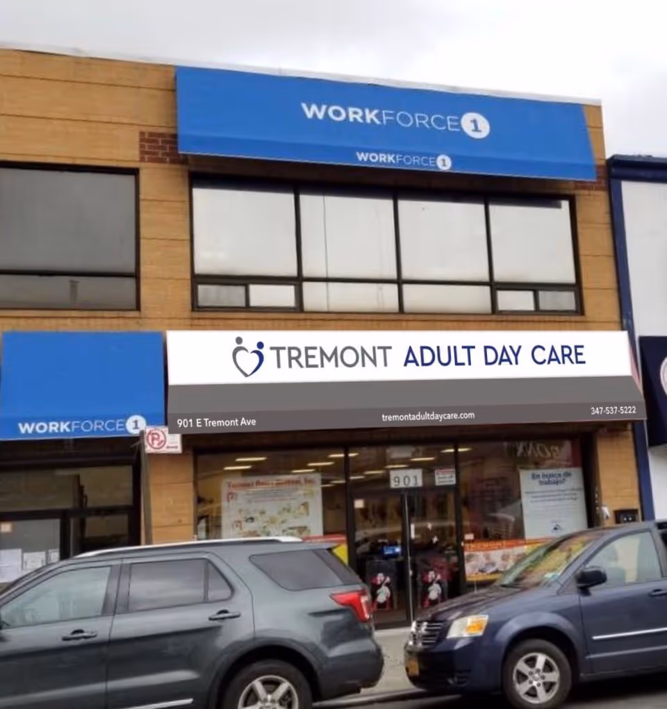 Exterior view of Tremont Adult Day Care storefront with blue signage.
