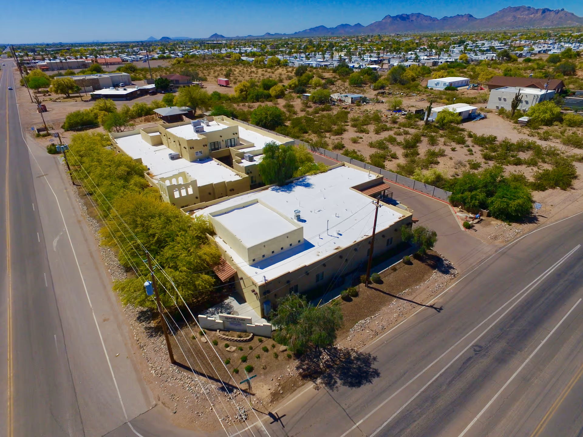 Aerial view of Visions Senior Living campus in Apache Junction, desert surroundings.