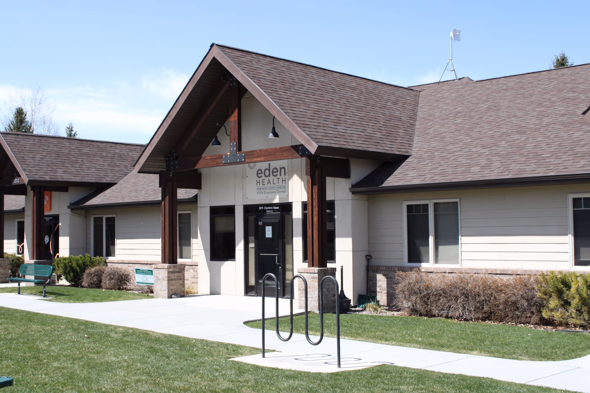 Eden Health facility exterior with a covered entrance and surrounding lawn.