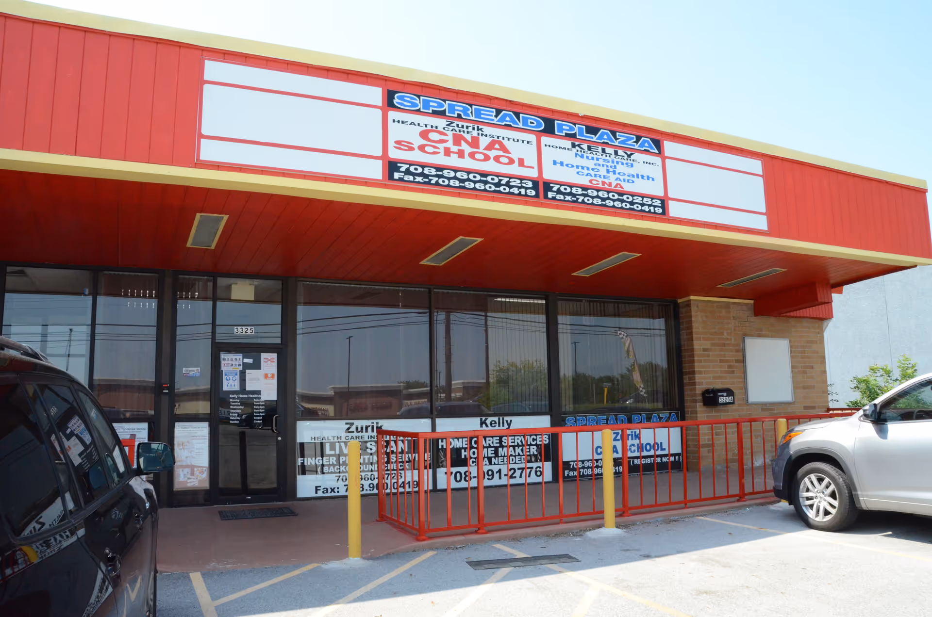 Red storefront with large windows and a Zurik Healthcare Institute sign outside.