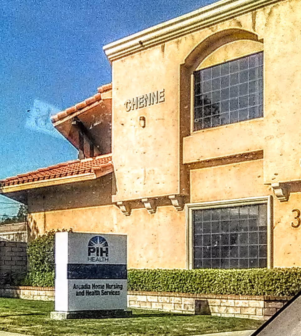 Exterior view of PIH Health Arcadia home health building with signage and manicured landscaping.