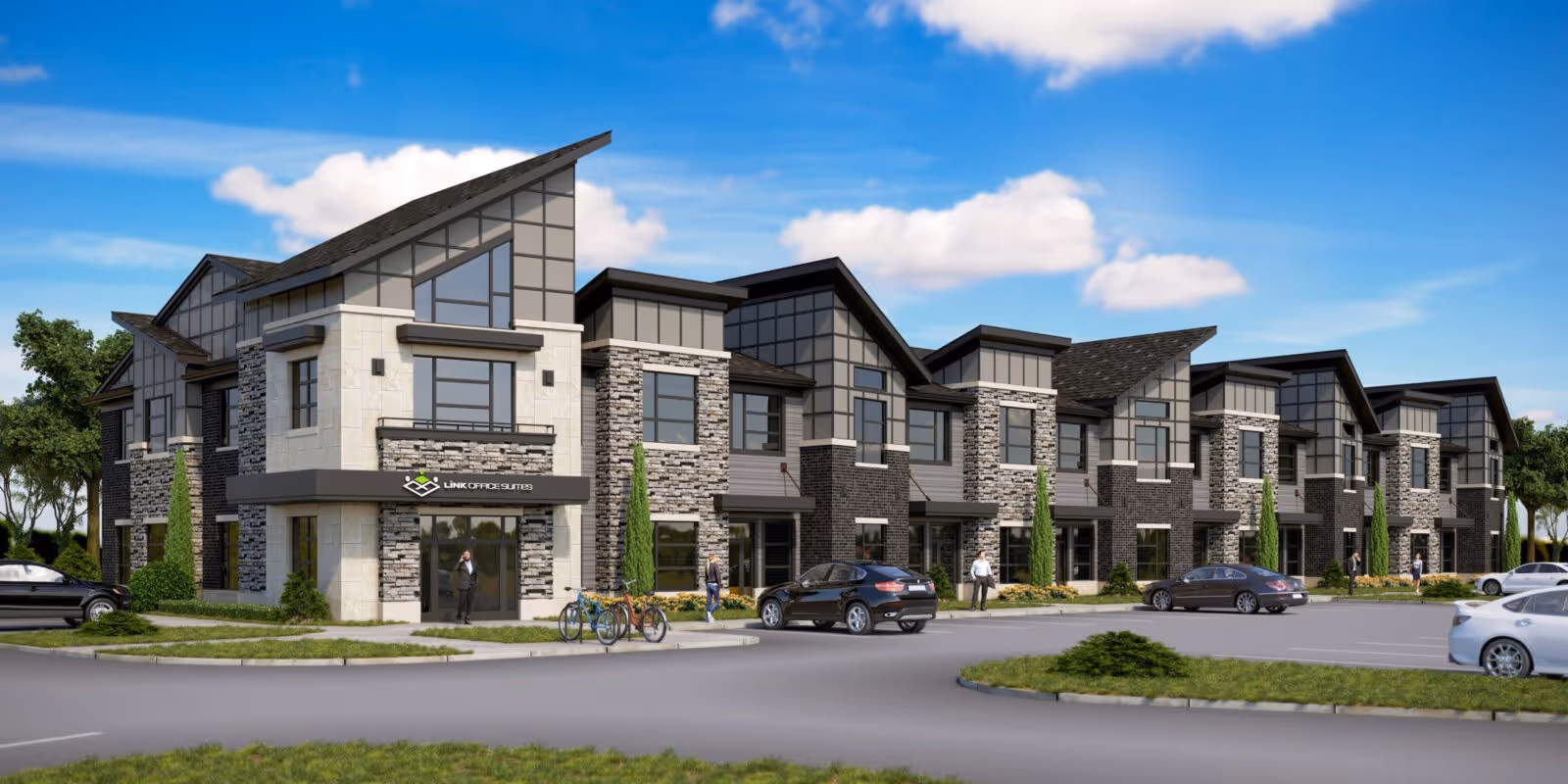 Exterior view of a modern senior living facility with stone accents and parked cars.