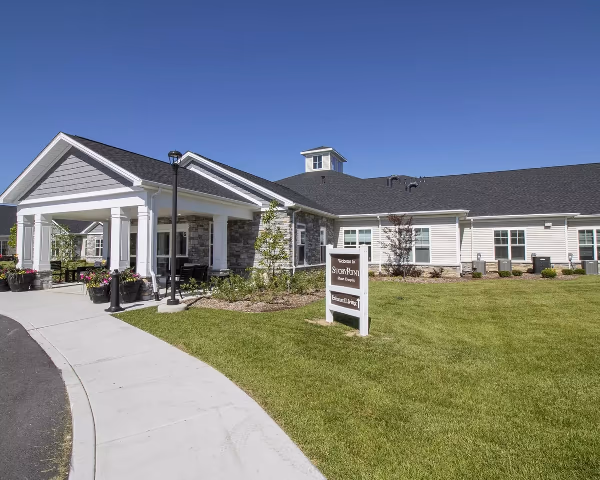 Exterior view of StoryPoint Chesterton facility with covered entrance and manicured lawn.