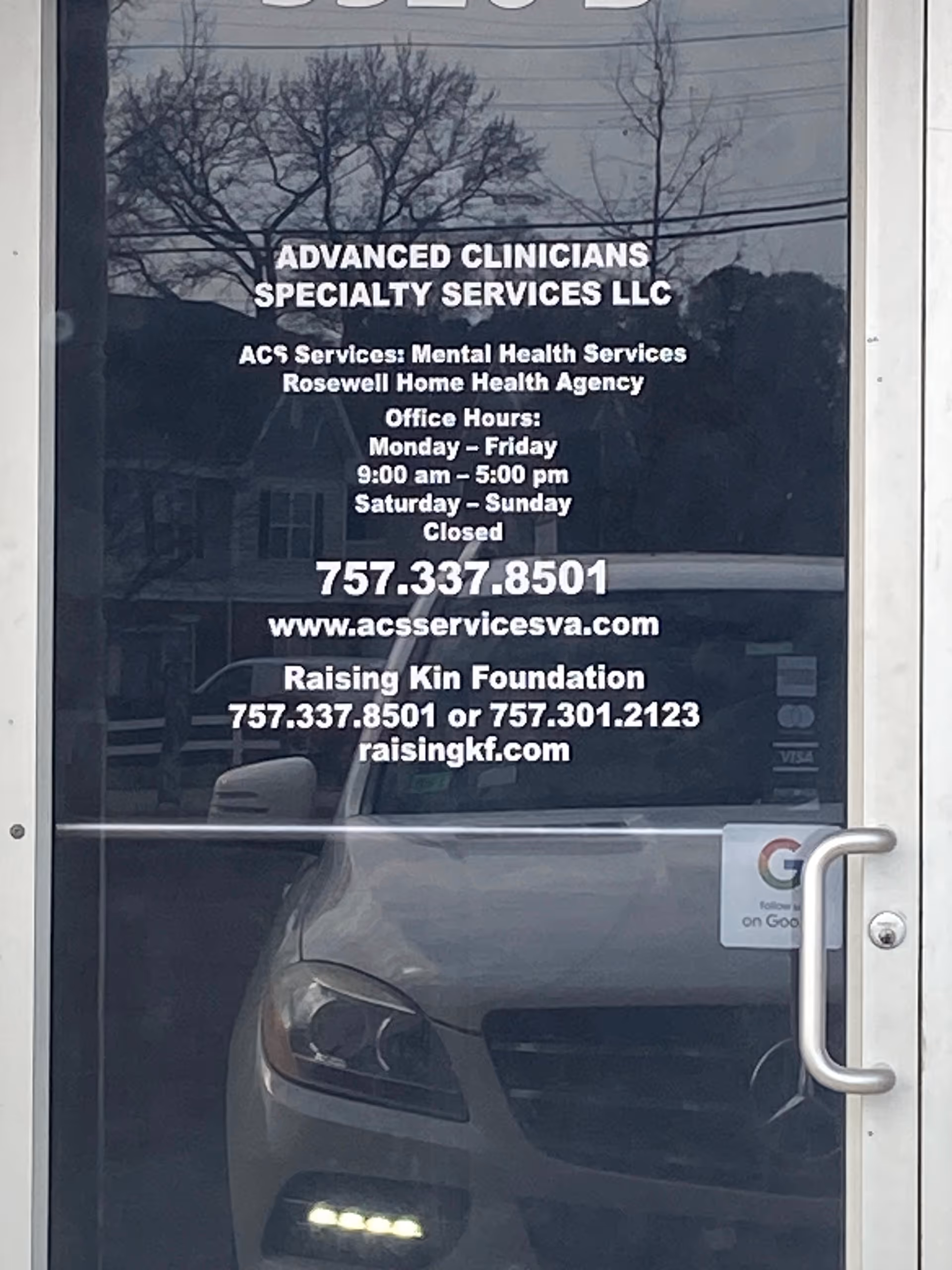 Glass door storefront with Rosewell Home Health Agency signage and contact information.