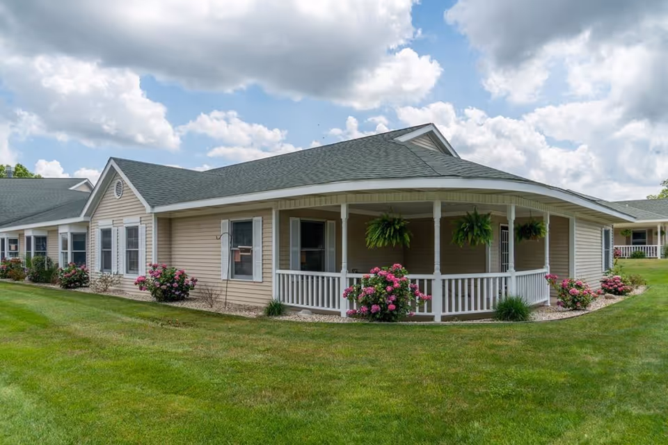 Front view of Addington Place of Lakeside Vista, a single-story senior living facility with covered porch.