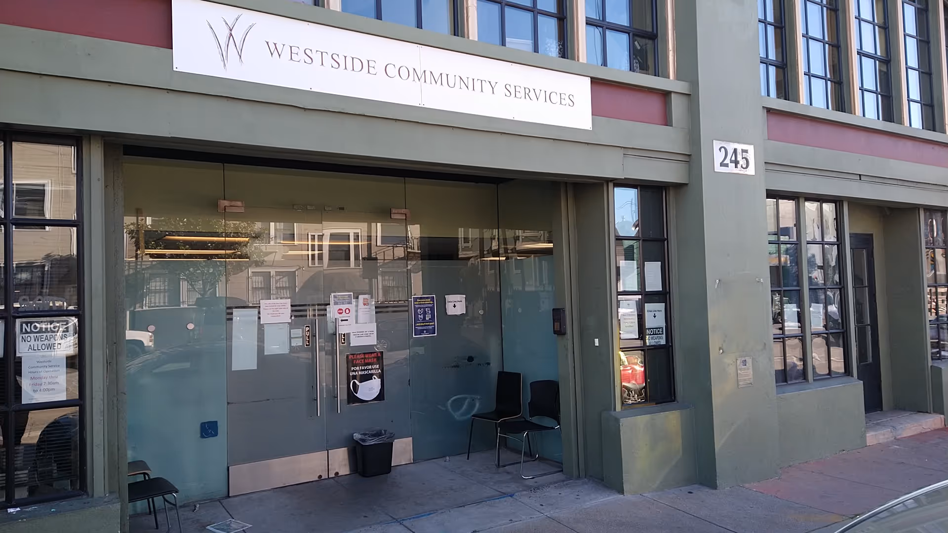 Front view of Westside Community Services building with entrance doors and signage.