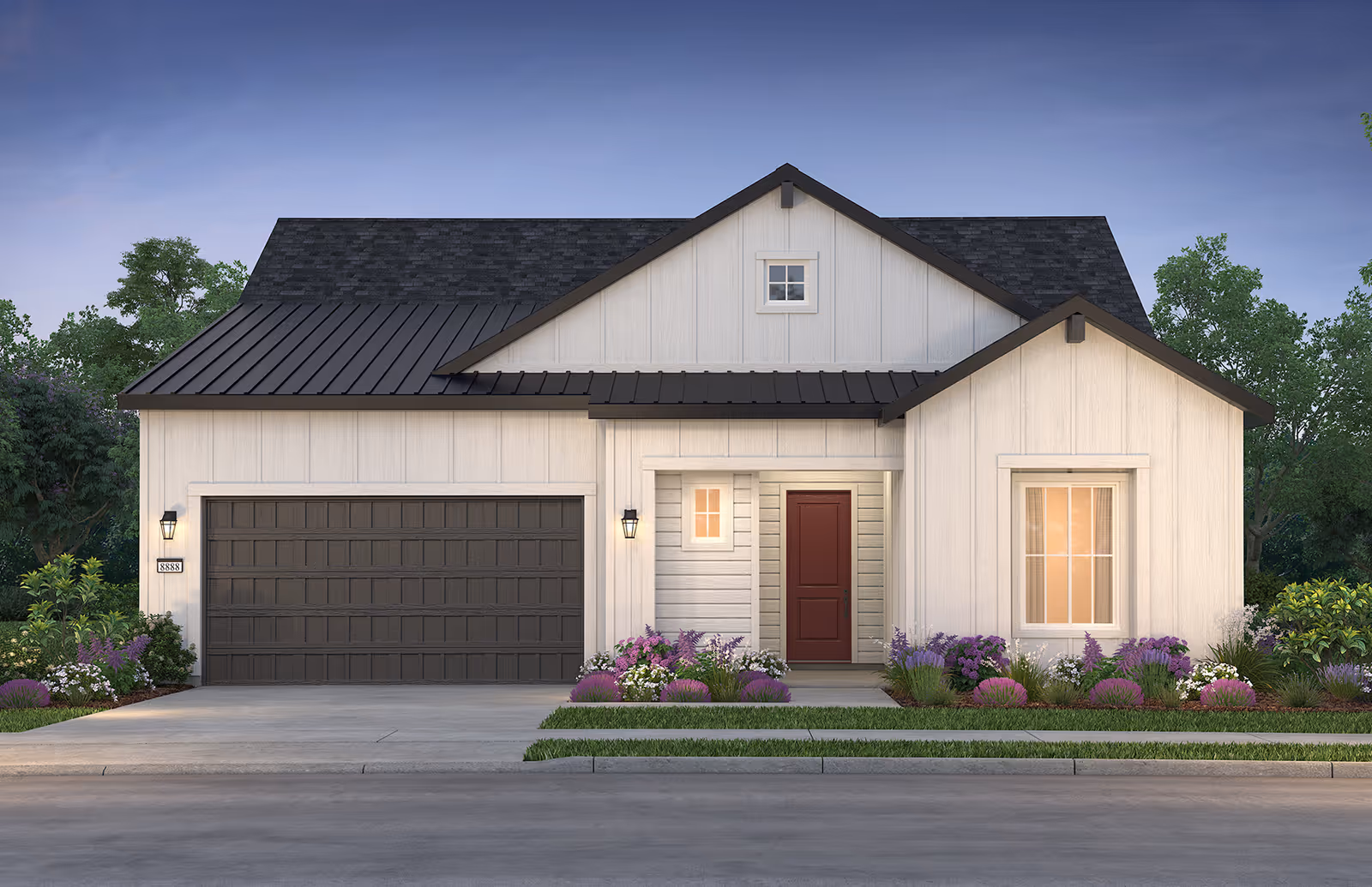 Front exterior view of a beige, house-style building with a two-car garage and landscaping.