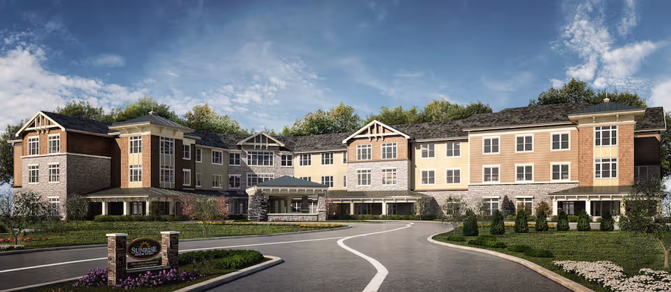 Sunrise of Bridgewater senior living facility exterior with curved driveway and landscaped entrance