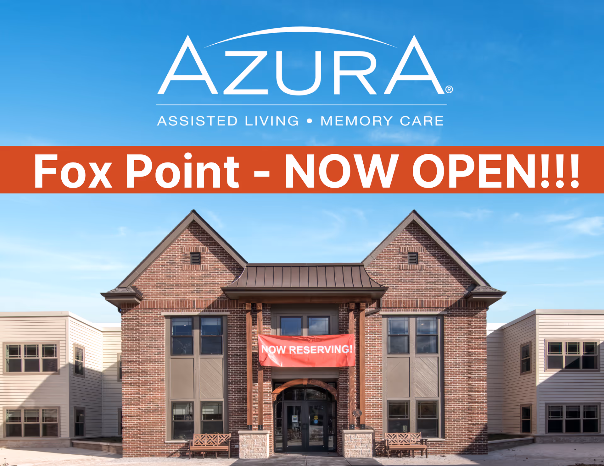 Front exterior view of Azura Assisted Living and Memory Care building in Fox Point with a clear blue sky. A red banner above the entrance reads 'NOW RESERVING!' and a large text overlay says 'Fox Point - NOW OPEN!!!'.