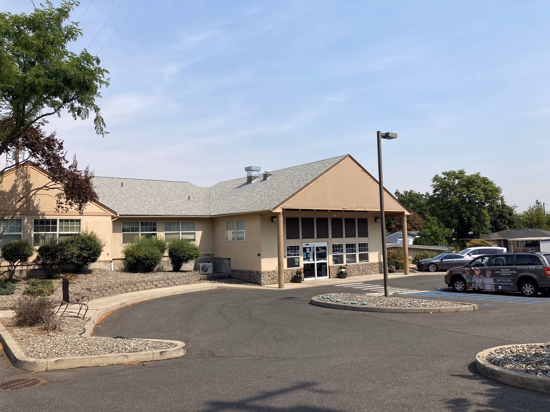 Exterior view of Prestige Care & Rehabilitation - Clarkston, showing entrance and parking.