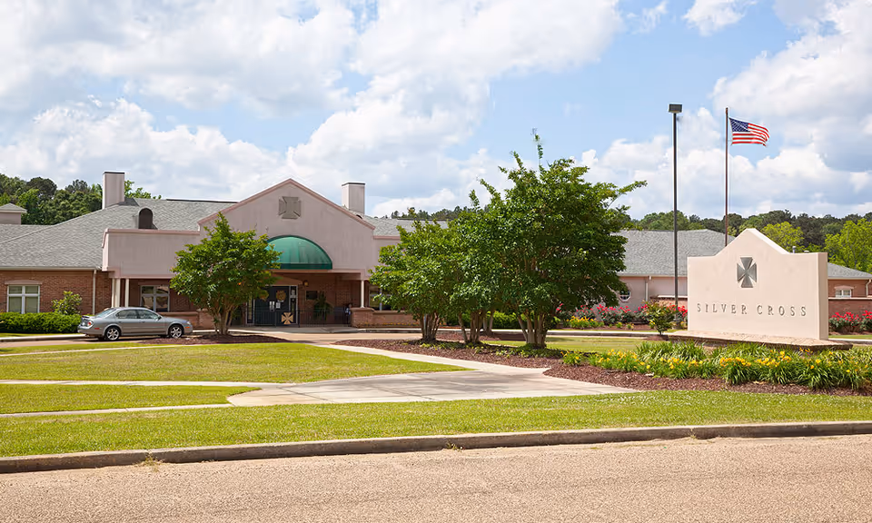 Exterior view of Silver Cross Health and Rehab facility with entrance and sign