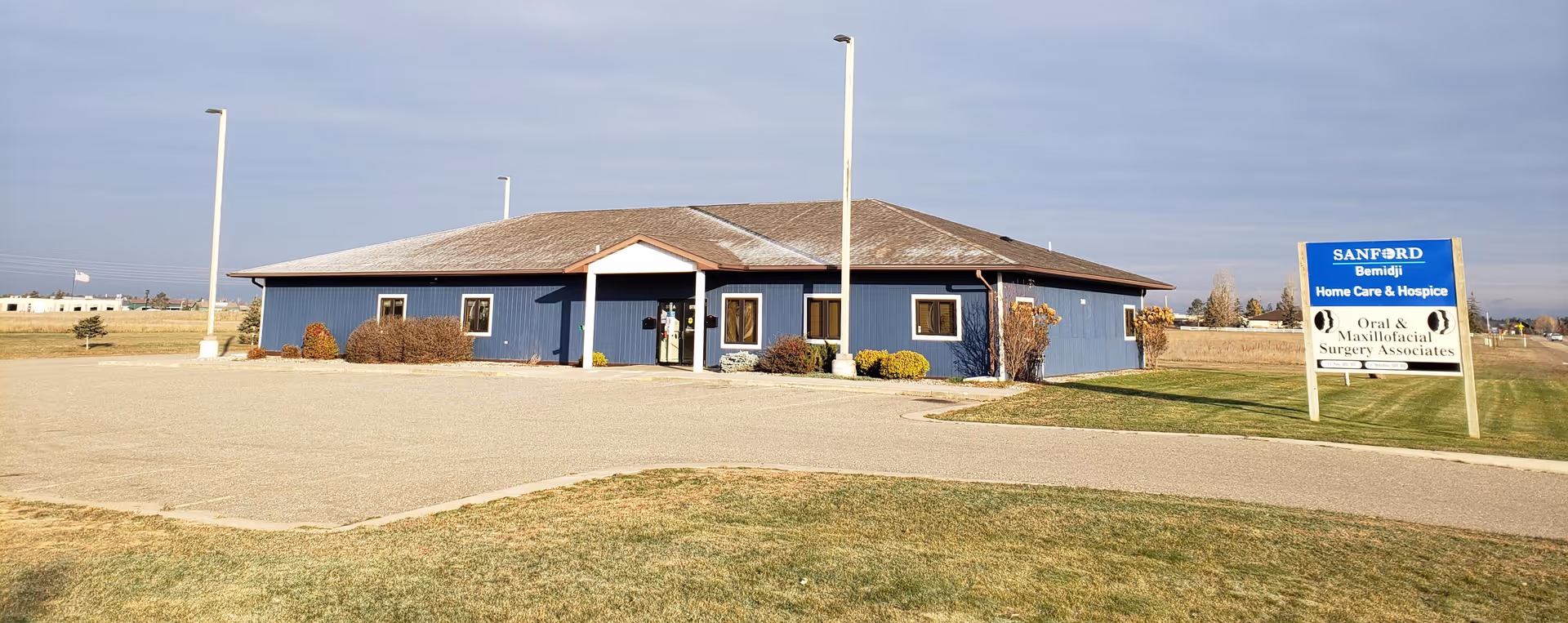 Blue single-story facility with Sanford Bemidji Home Care & Hospice sign in front