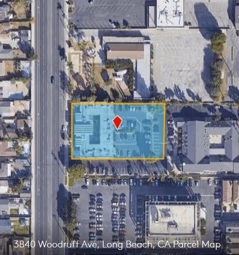 Aerial view of Ayanna Cares facility highlighting the building and surrounding parking area.