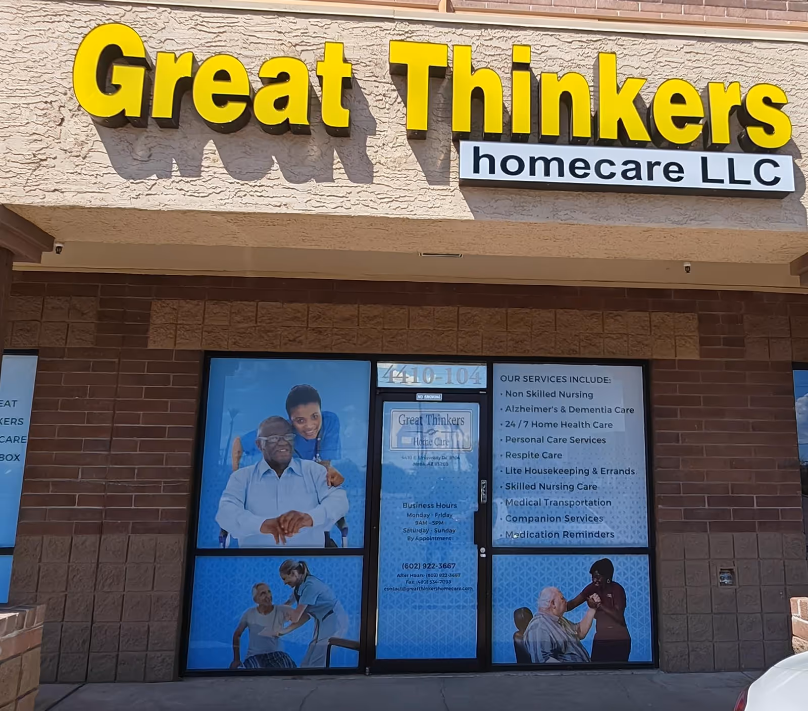 The storefront of Great Thinkers Homecare LLC with a large yellow sign and posters.