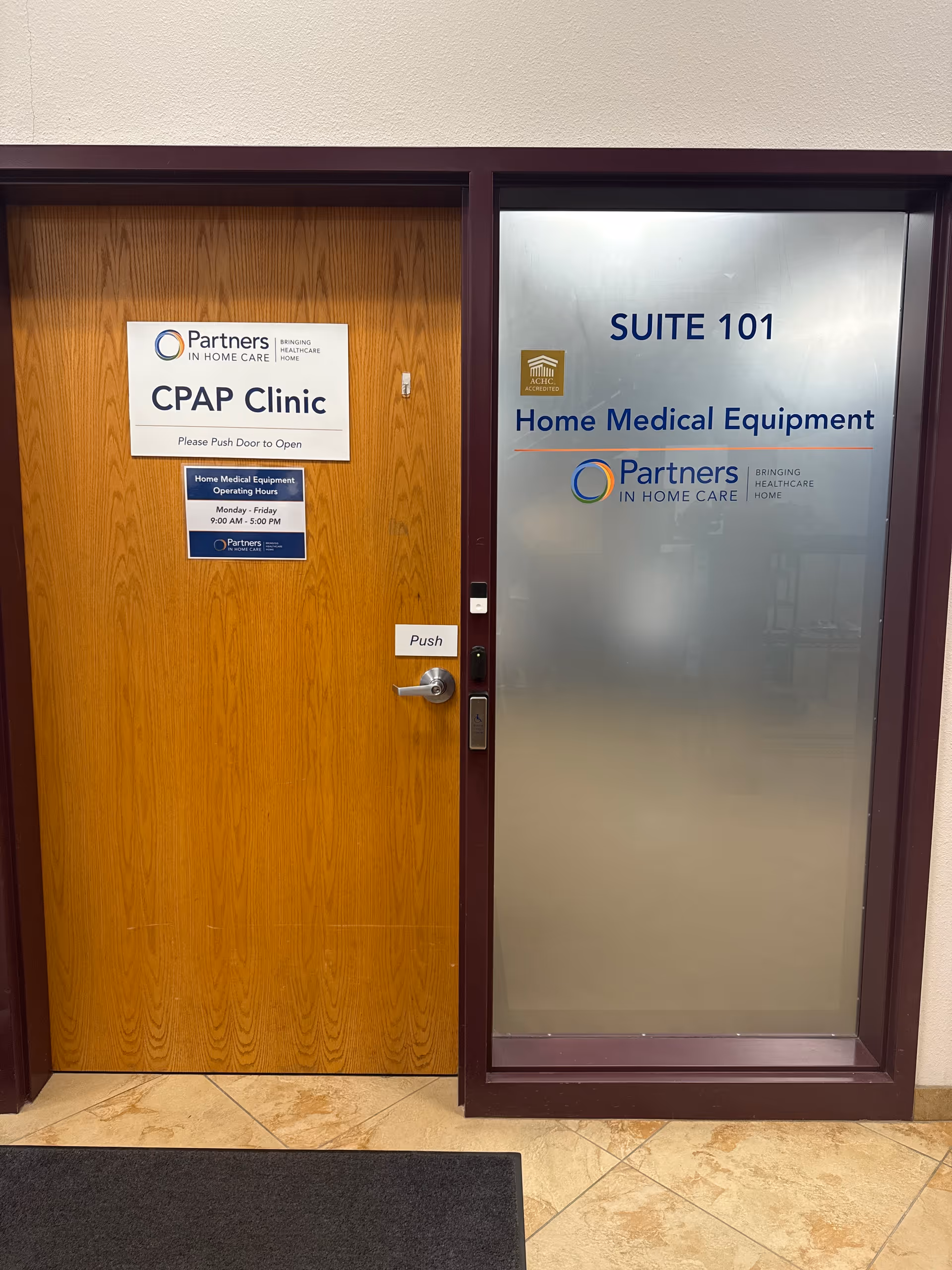 Two interior doors with CPAP Clinic sign and Suite 101 Home Medical Equipment signage.