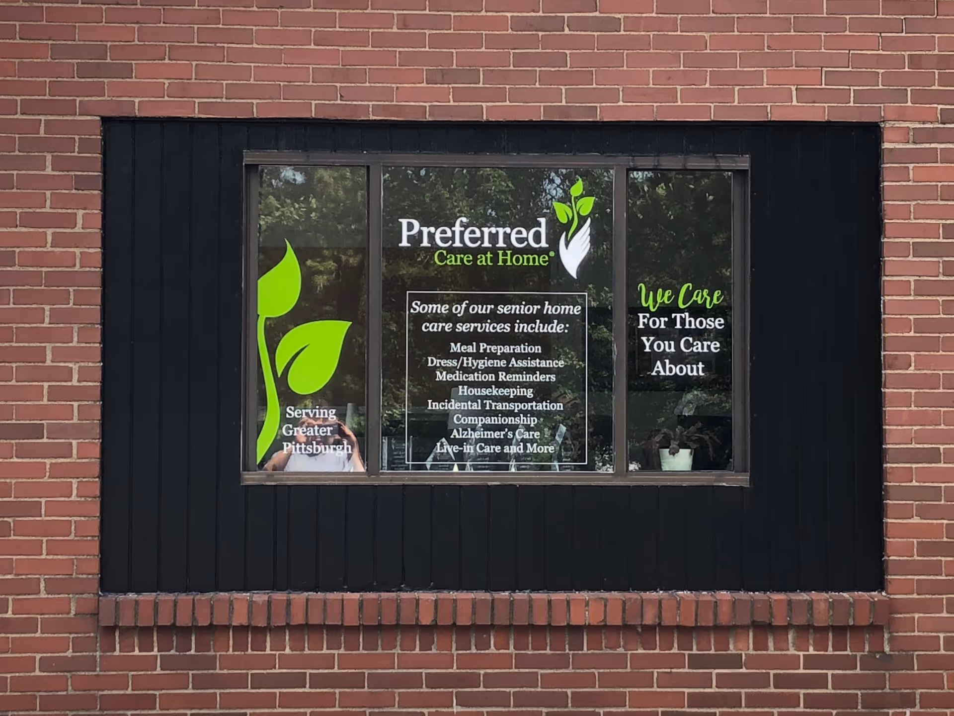 Brick exterior with a window sign reading Preferred Care at Home of Pittsburgh.