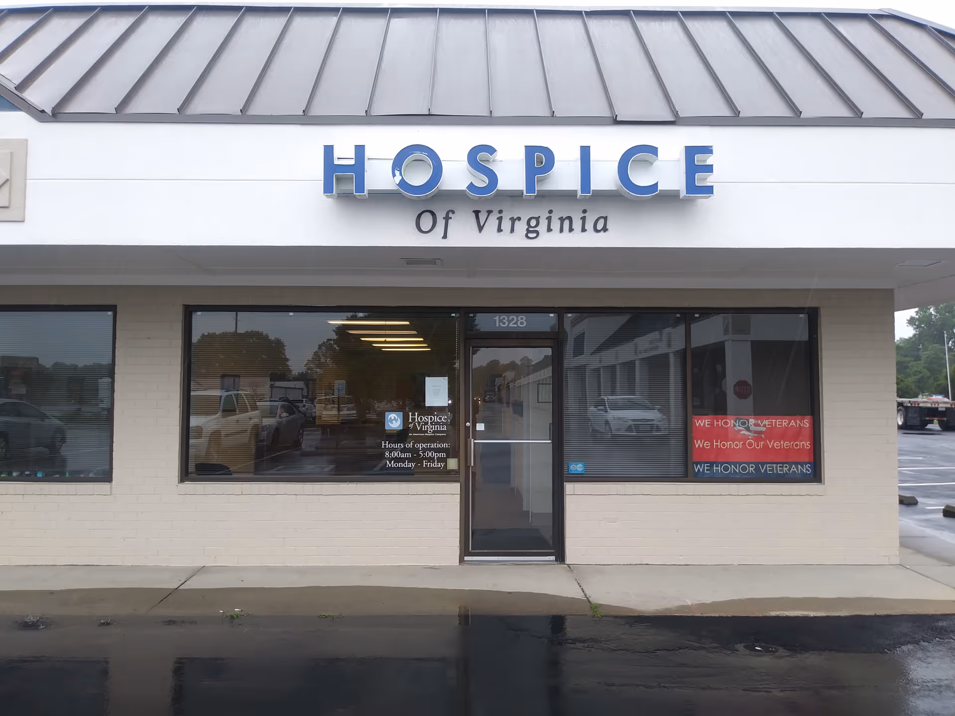 Front view of a Hospice of Virginia building with large windows and entrance door.
