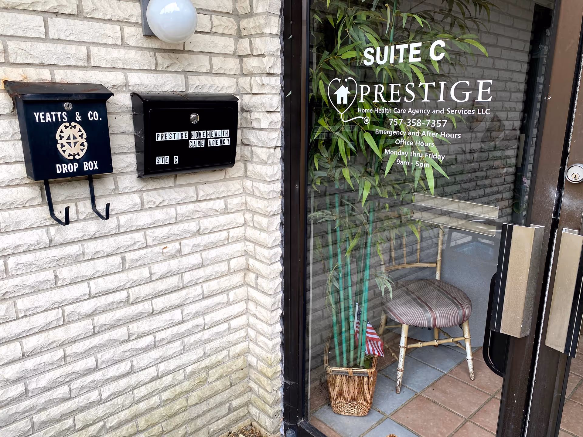 Exterior view of Prestige Home Health Care entrance with glass door and wall signs.