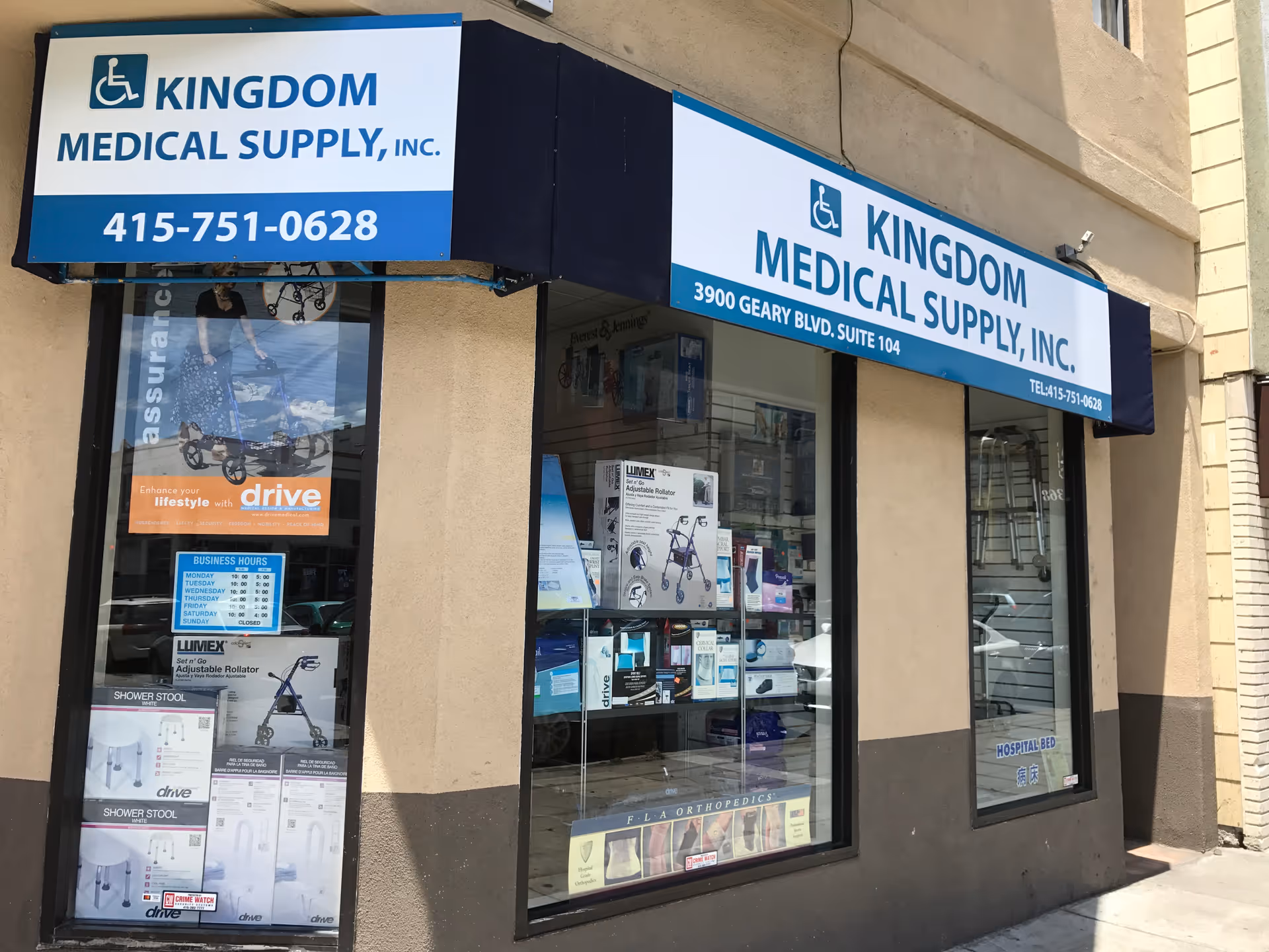 Exterior of Kingdom Medical Supply storefront featuring blue and white signs and display windows.