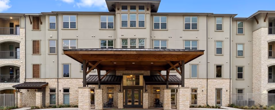 Facade of Preserve at Willow Park with stone accents and a covered entrance.
