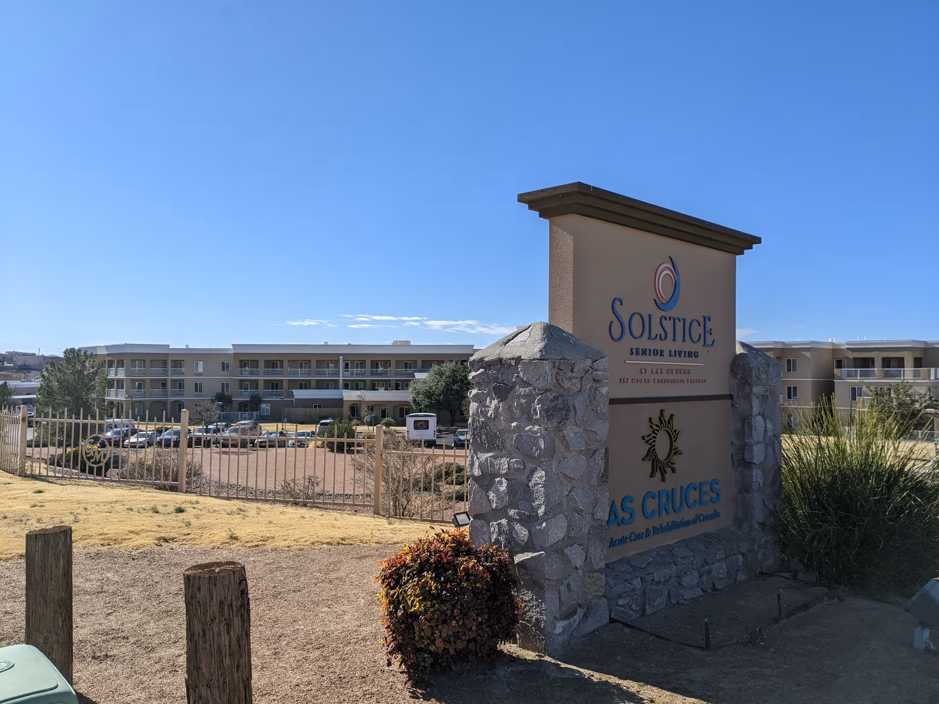 Solstice Senior Living front exterior with sign at Las Cruces under clear blue sky