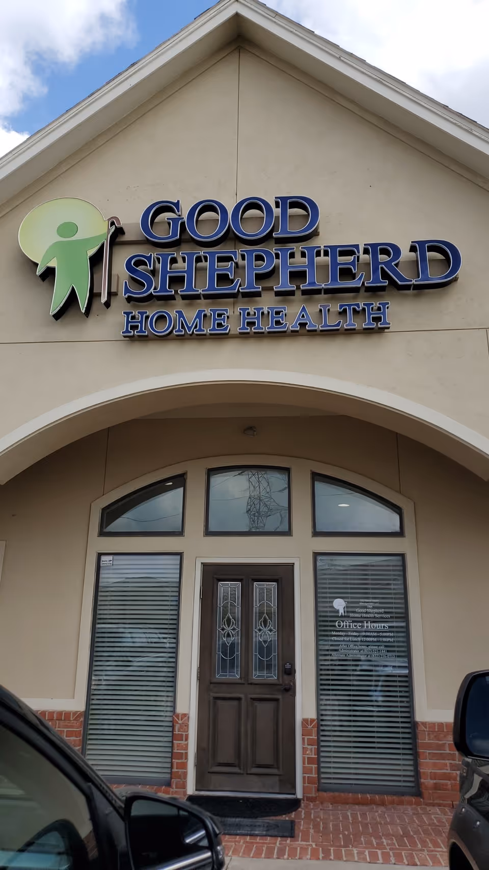 Front facade of Good Shepherd Home Health entrance with sign on the building.