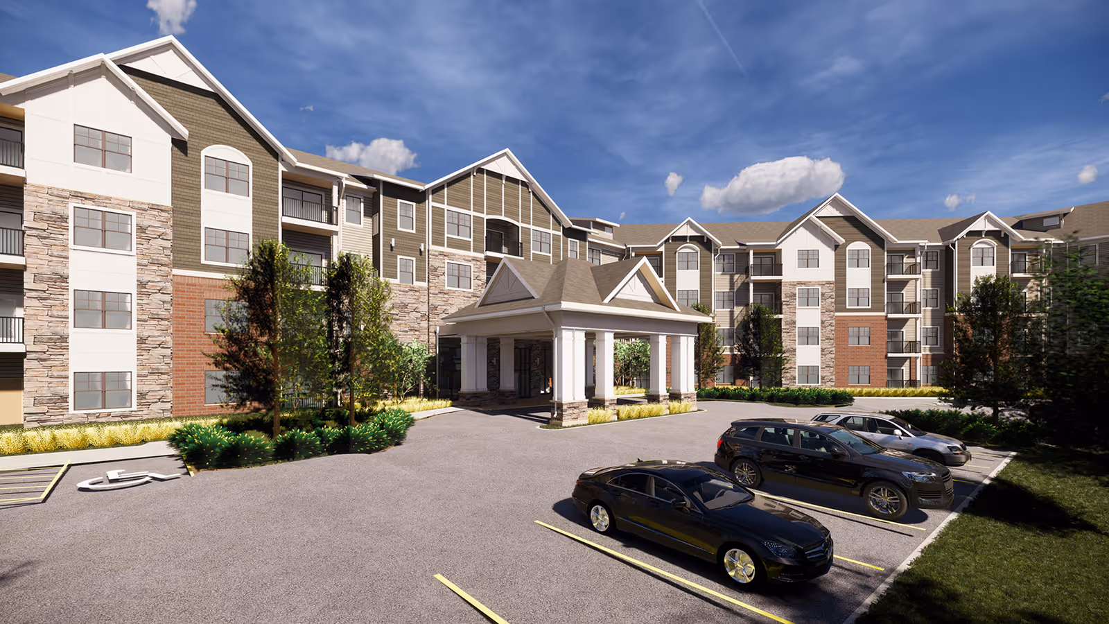 Front exterior of a multi-story senior living building with a covered portico entrance and parked cars in the lot.