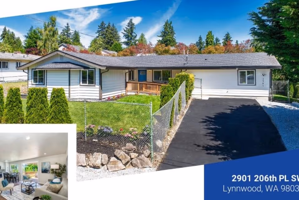 A single-story care home with a fenced front yard and paved driveway.