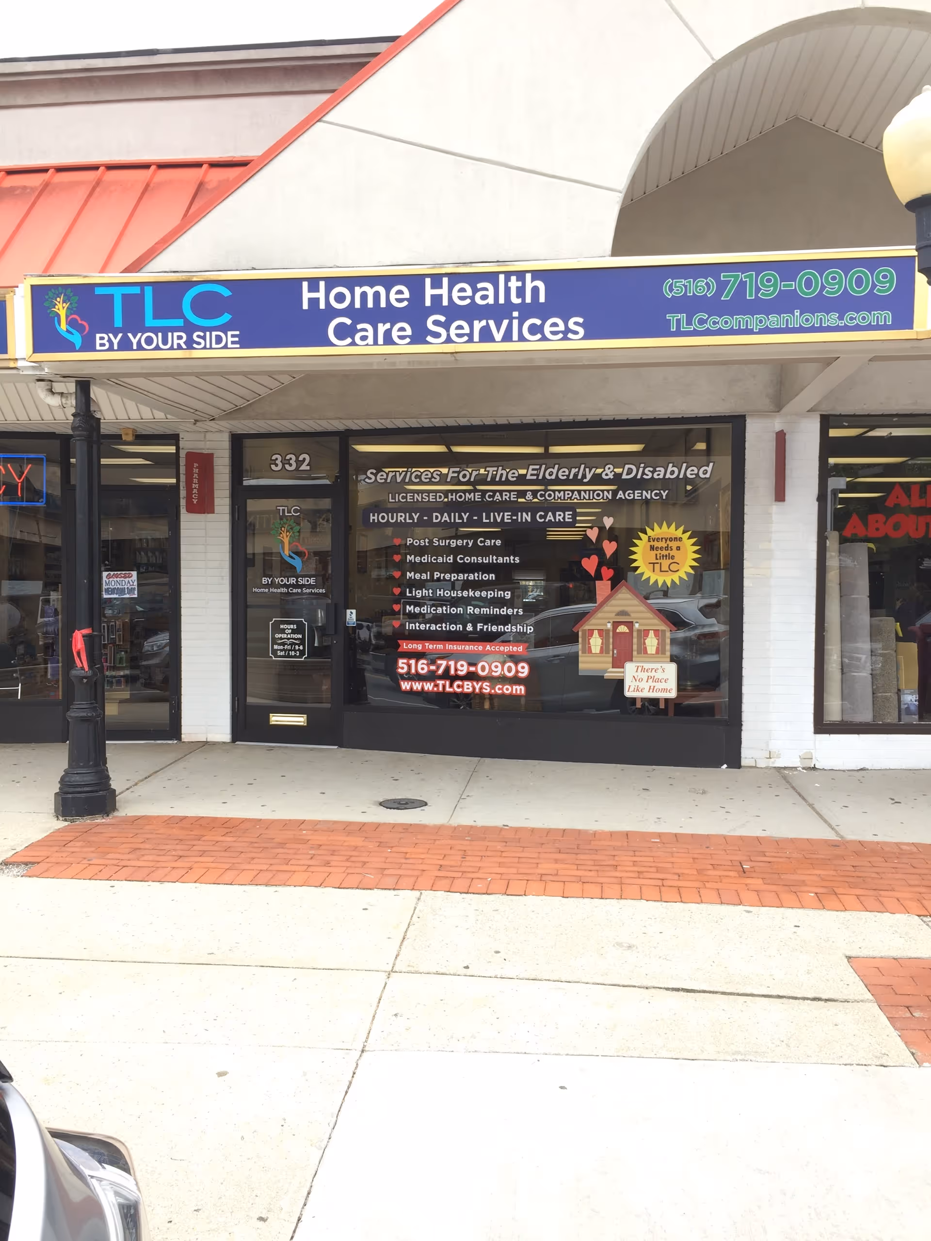 Storefront sign for TLC by Your Side Home Health Care Services with glass windows.