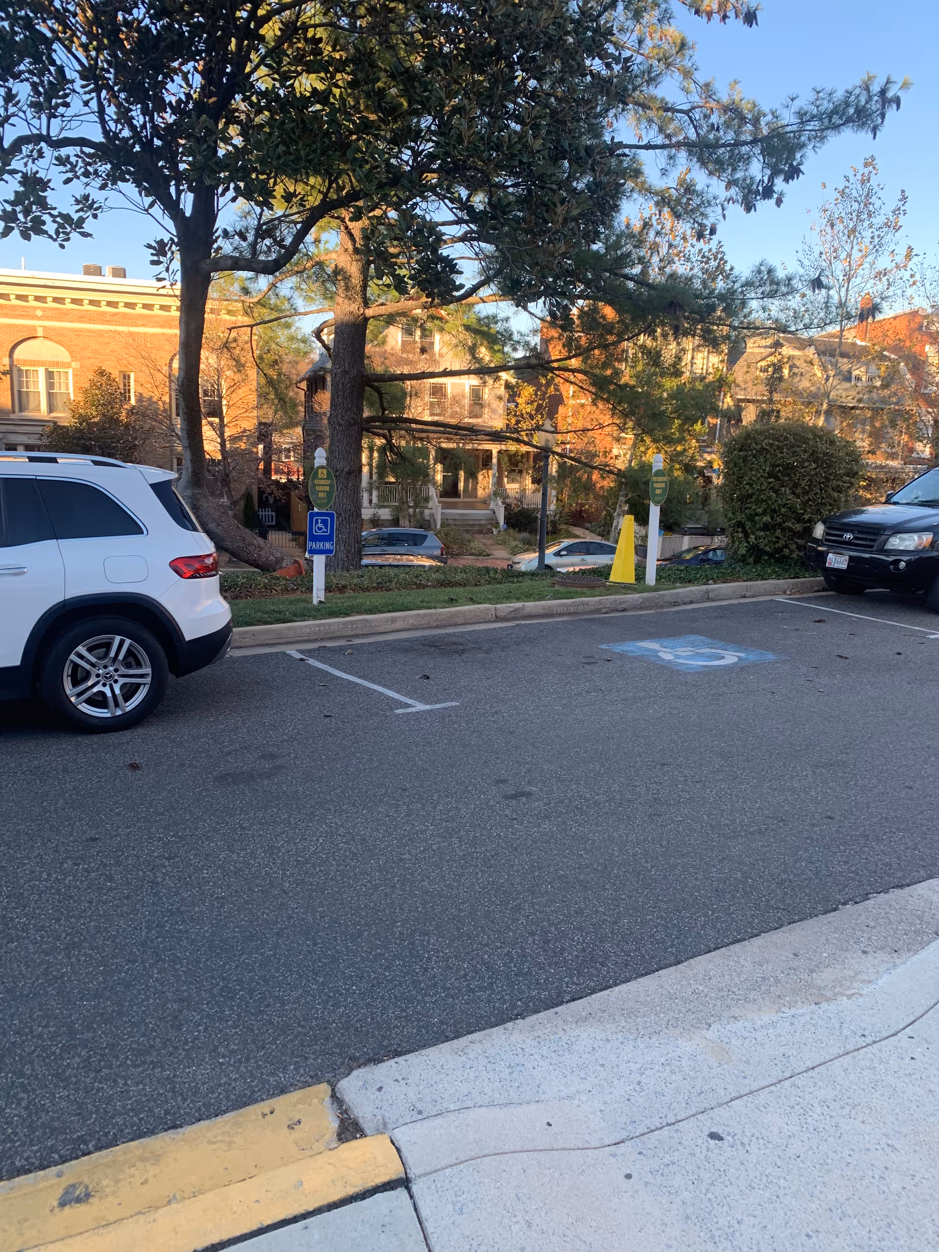Exterior view of Stoddard Baptist Nursing Home showing the entrance, brick facade, and parking.