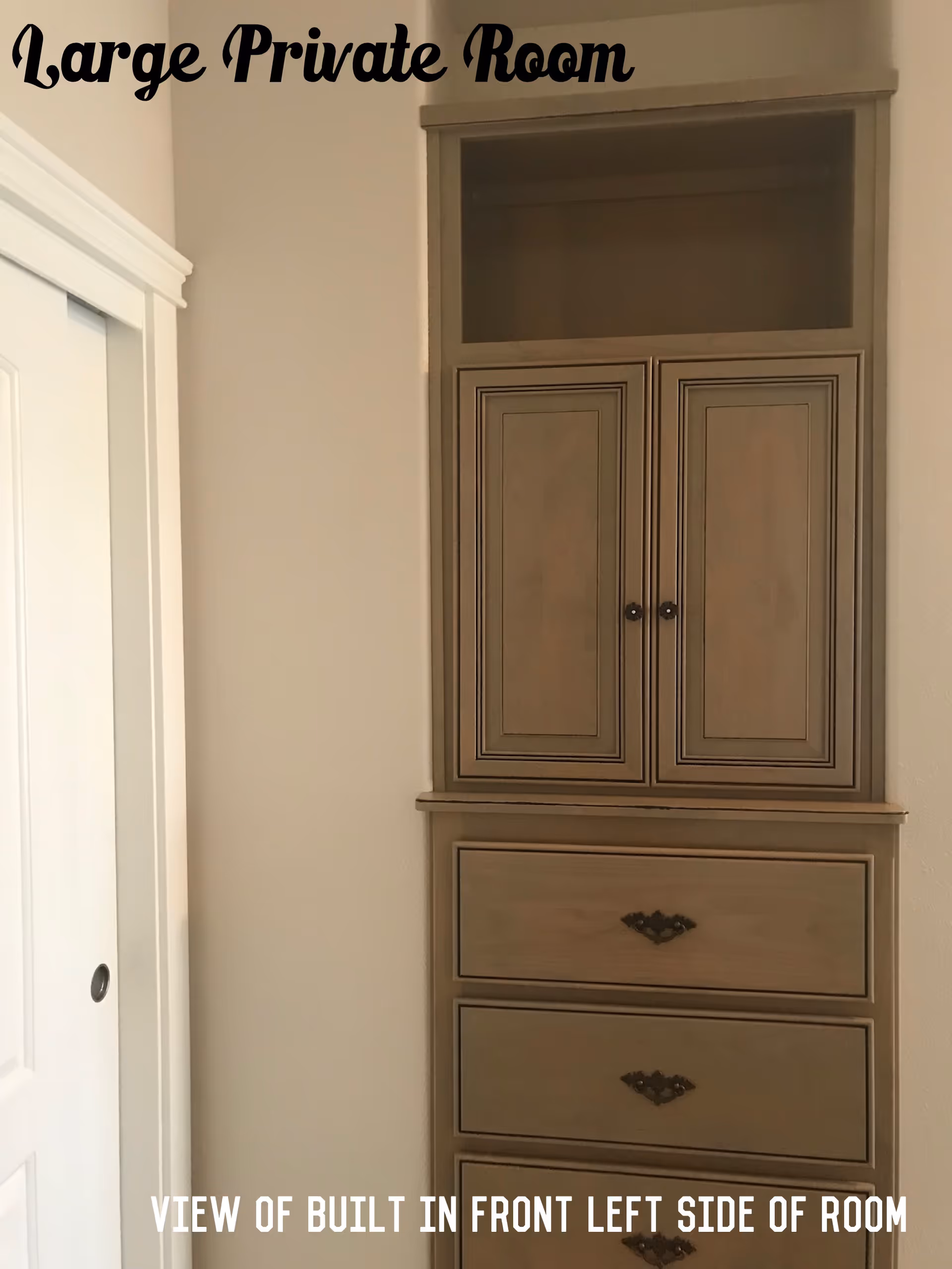 Tall built-in cabinet with upper doors and lower drawers in beige interior