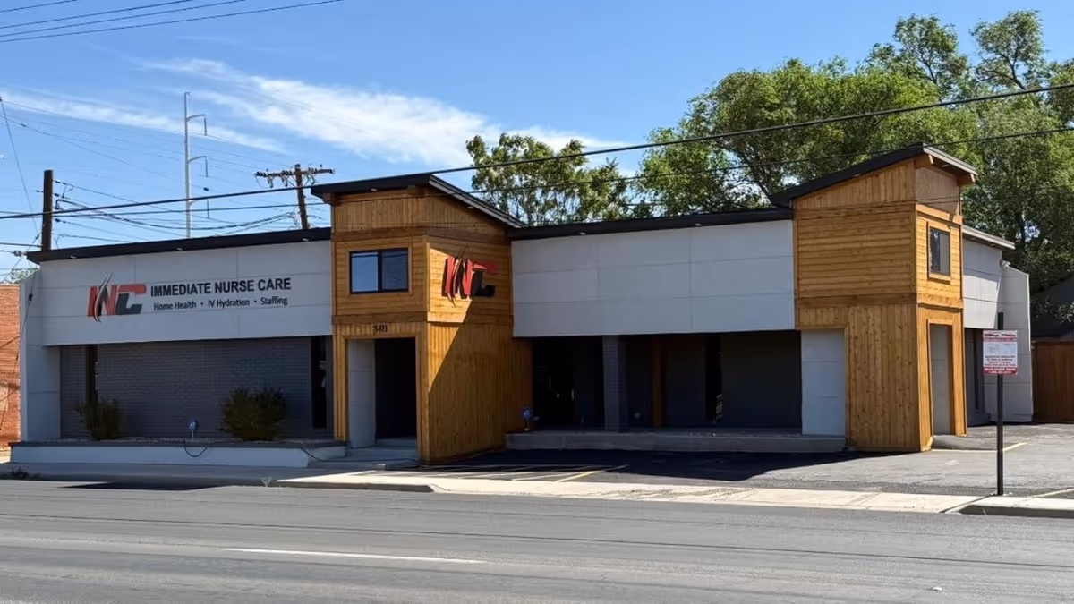 Exterior view of Immediate Nurse Care Staffing Inc building along a street.