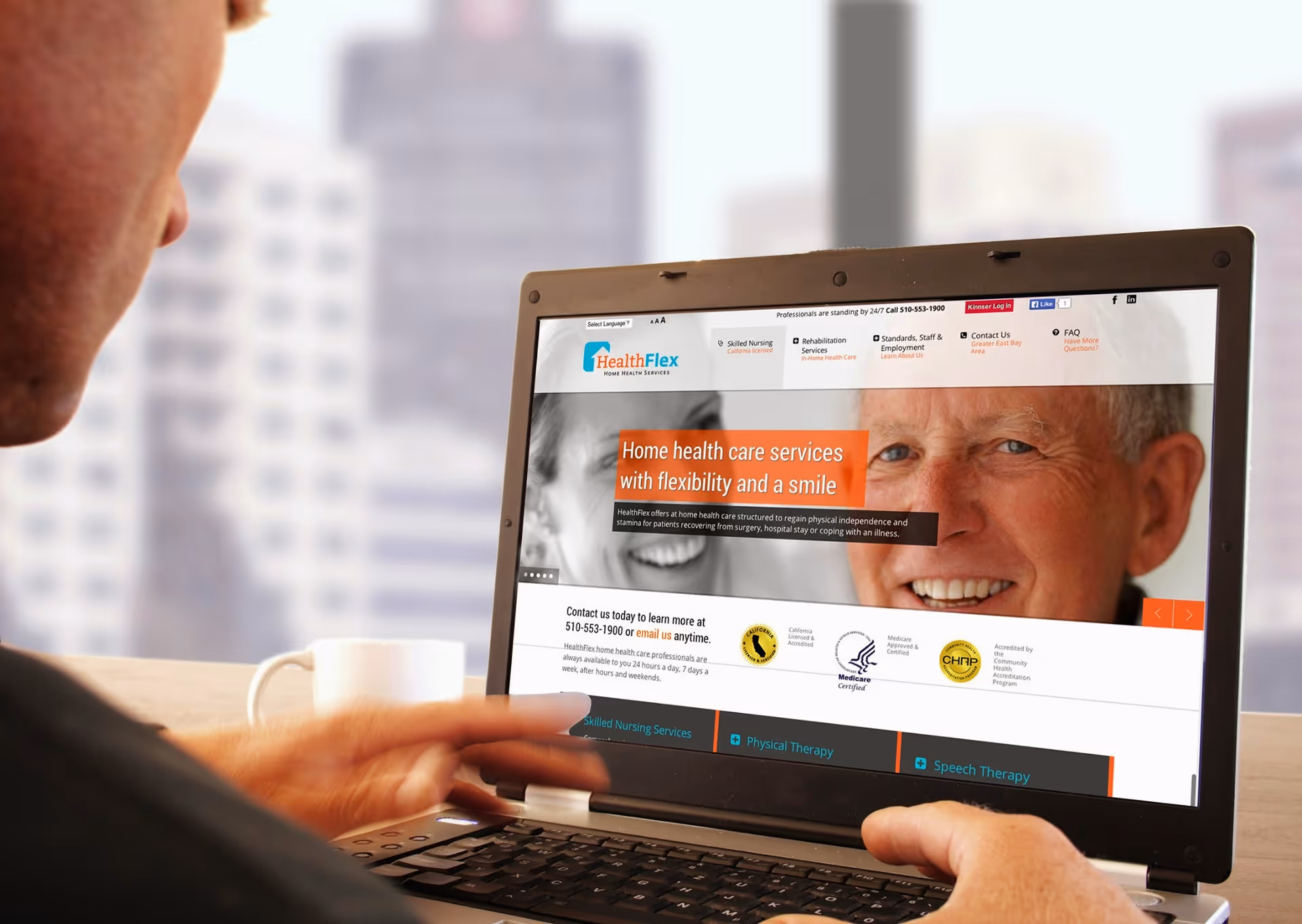 Person using a laptop to view the HealthFlex Home Health & Hospice website.