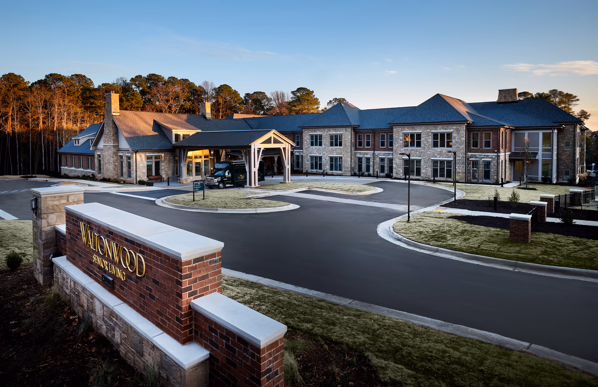 Exterior view of Waltonwood Lead Mine senior living campus with circular entrance drive.